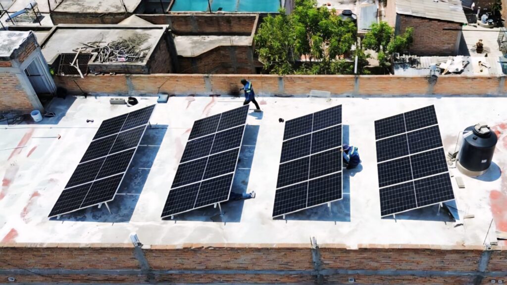 Aerial view of a residential rooftop solar panel installation completed by Energias RGM for clean energy generation and electricity savings.